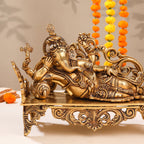 Brass Superfine Ganesha Resting On Couch (9 Inch) Vedansh Craft