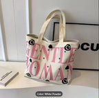 THE SACK CO. Large Canvas Tote Bag for Women, Tote Handbags for Women with Zipper for College, Shopping, Office (gntl women pink writing wht new)