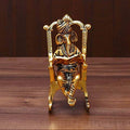 Prince Home Decor & Gifts Brass 3D Moving Lord Ganesha Statue – Intricately Crafted Idol of Ganpati Sitting on Chair Reading Ramayan – Unique Spiritual Showpiece for Home