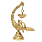 SVARUP Brass Peacock Diya in Gold Color Color: A Classic and Elegant Diya with a Peacock Design