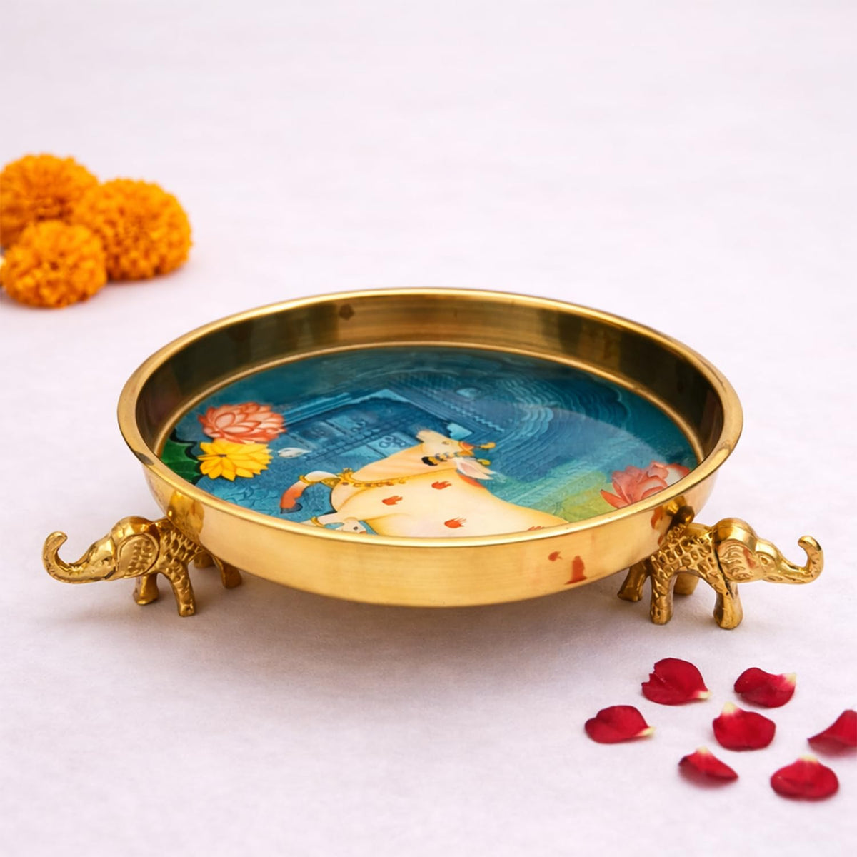 Kaari Tales Pichwai Art Kamadhenu Urli Bowl with Elephant Base | 10-Inch Decorative Metal Urli for Floating Flowers, Diya & Candle | Brass Finish Home Decor for Diwali, Pooja, & Table Centerpiece