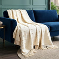 SAJAVAT HOME Hand Knitted Cotton Sofa Throw Blanket for Sofa & Bed | Soft All-Season Throw for Couch, Chair & Travel | Decorative Knitted Design | 80×52 Inches (204×132 cm) | Beige with Tassels Kafalo