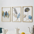 Mahira Artefacts Metal Leaf and Floral Wall Art Decor, Set of 3, Gold, Blue and Silver, Triptych Framed Sculptures for Living Room