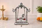 KridayKraft Silver Plated Metal Krishna Jhula with Elephant Design Stand | Lord Krishna on Swing Idol for Home Decor, Janmashtami Puja, Temple, & Spiritual Gifting.