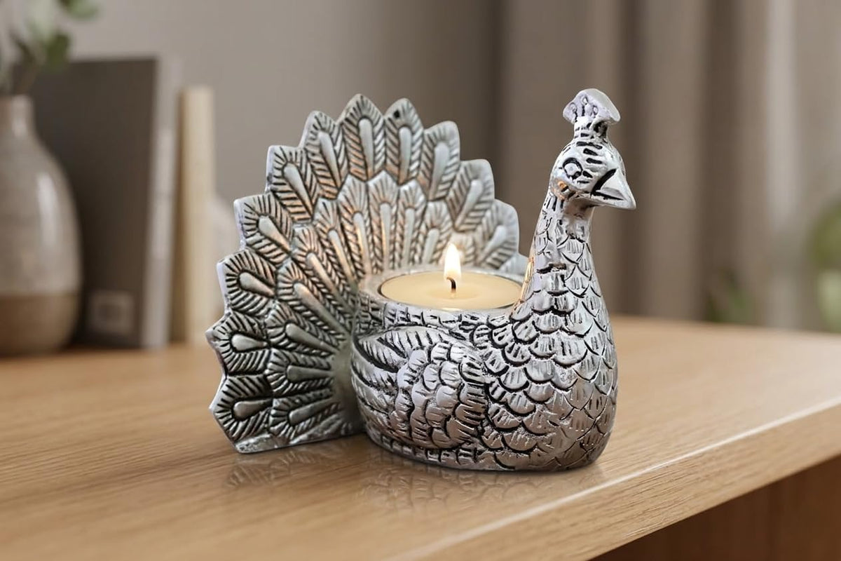 KridayKraft Designed with a Versatile Central Cavity, This Peacock Serves as a Stunning tealight Candle Holder, a mini Indoor Planter, a Unique Pen Stand,(Peacock Small Silver).