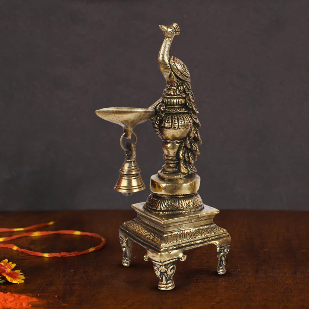 Artvarko Brass Peacock Bird Hanging Diya Oil Lamp Stand with Bell Home and Office Decoration Diwali Decoration Gift Items 10 Inches