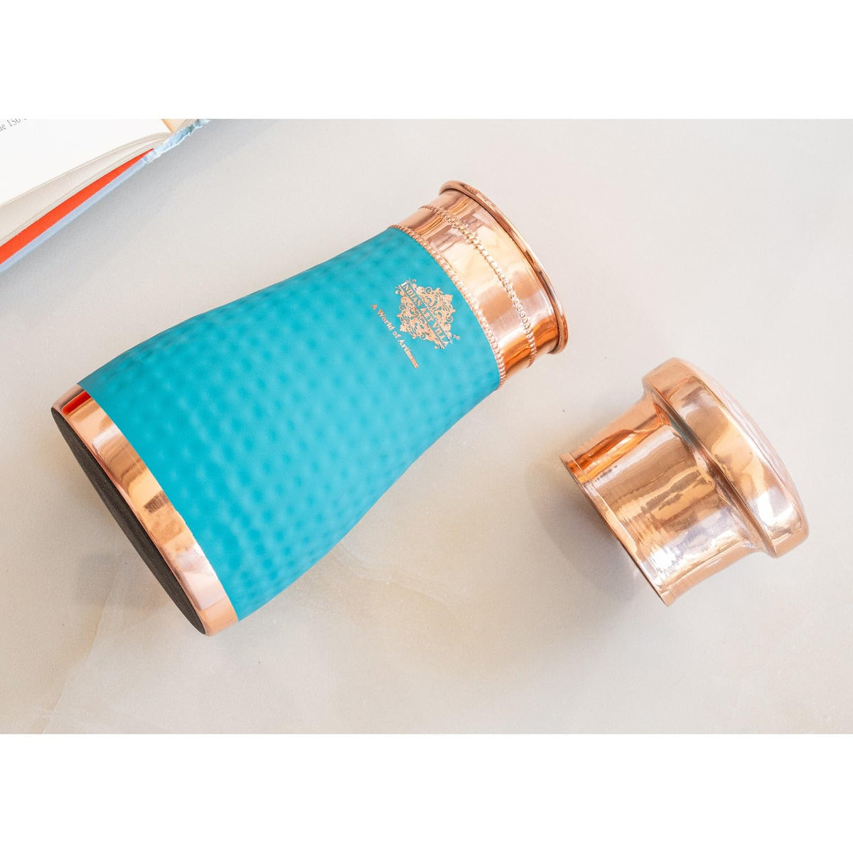 INDIAN ART VILLA Copper Hammered Sky Blue Silk Finish Bedroom Bottle with Inbuilt Glass, 600 ML, Health-Boosting Water Bottle, Ideal for Home, Office, Travel, and Gifting