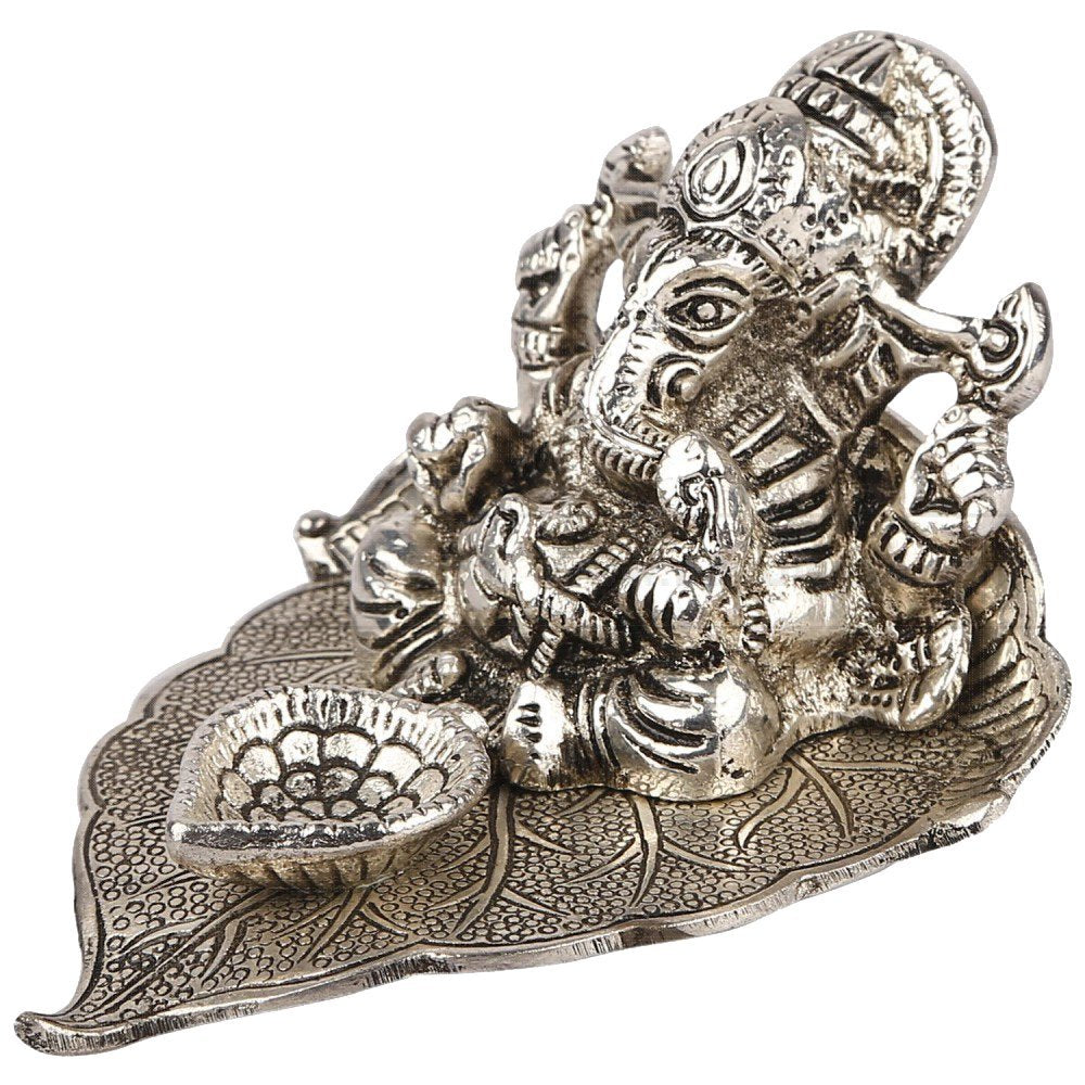 Prince Home Decor & Gifts Metal Silver Polish Ganpati on Leaf for Home Decor and Gift Purpose Ganesha on Leaf - Ganesh with Diya - Lord Ganesha (12 x12 x 8 cm)