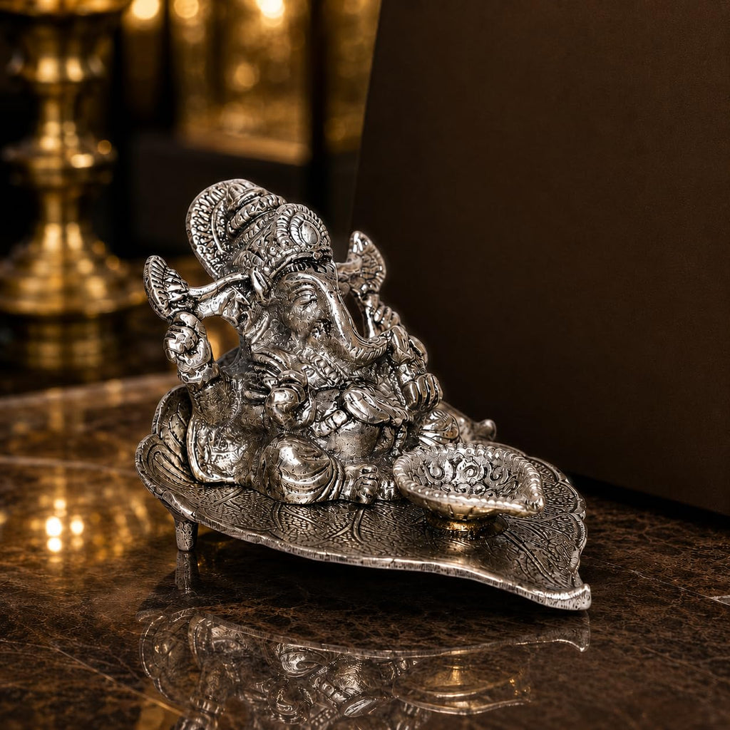 KridayKraft Ganesh Idol with Diya on Leaf, Metal Silver Finish Ganpati Murti for Home Decor, Pooja Room & Office Desk, Ganesha Statue for Diwali, Housewarming & Wedding Gift, 12 x 12 x 8 cm
