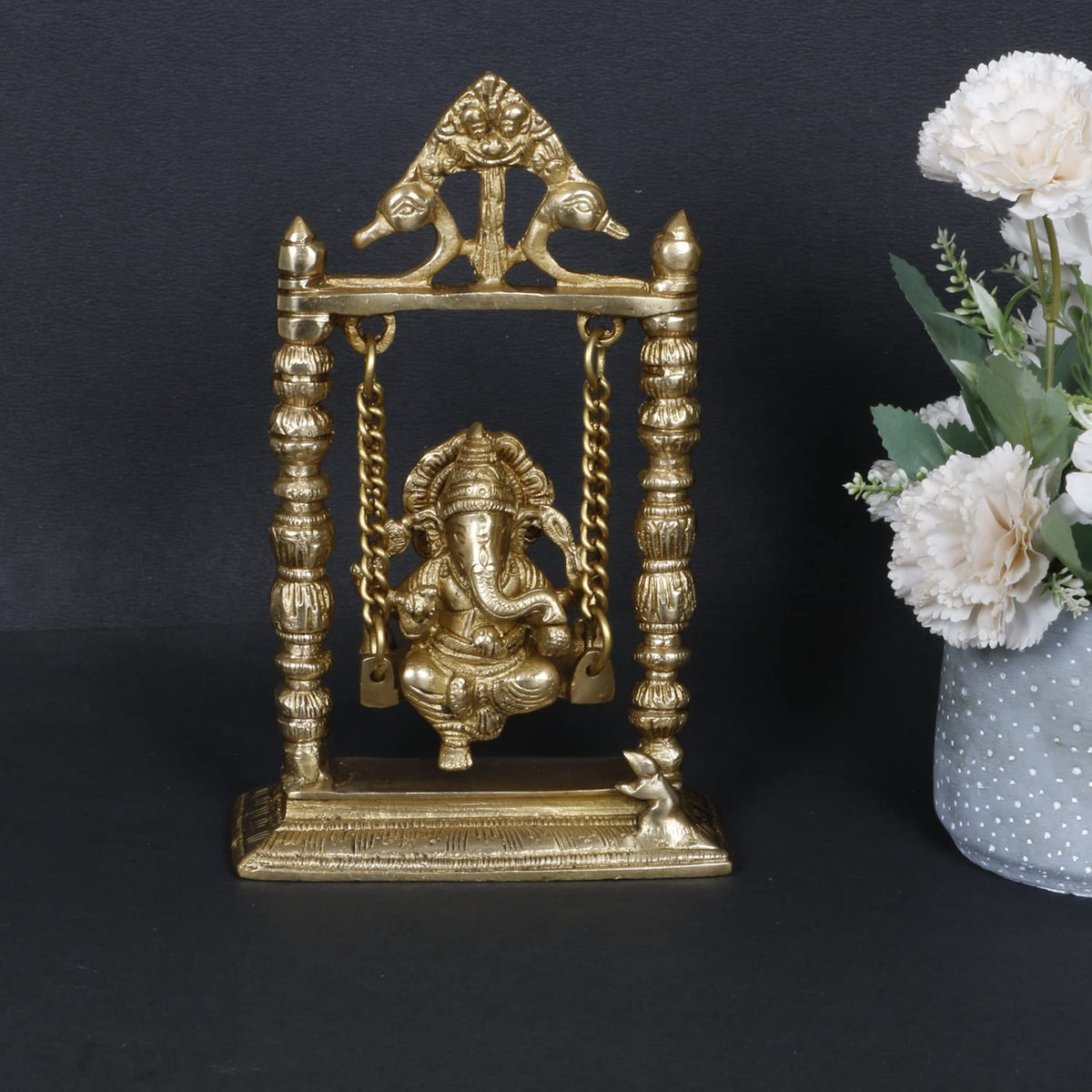 ARTVARKO Brass Lord Ganesha Bhagwan On Swing Brass Ganesh Idol Ganpati On Swing Jhoola Jhula for Home Office Temple Puja Décor Gift Height 22 Cm.