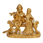 ARTVARKO Brass Radha Krishna Playing Flute Sitting on Couch with Peacock Statue Radha Krishan Ji Murti Temple Puja Office Home Décor Showpiece Gift 7 Inch.