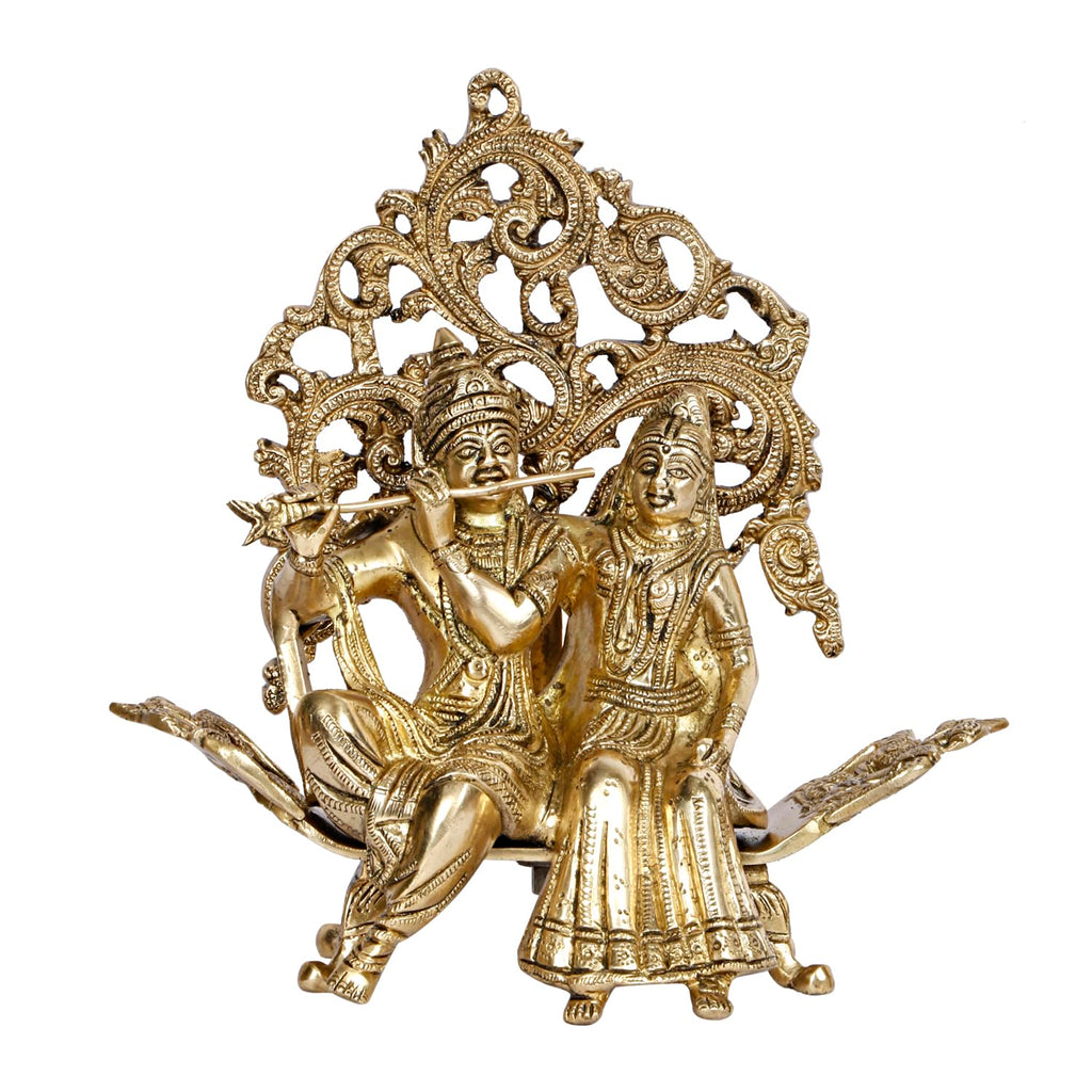 ARTVARKO Brass Radha Krishna Sitting on Couch Kalpvriksha Tree Love Couple Showpiece Idol for Home Décor Living Room Pooja Mandir Gift Item 24 cm