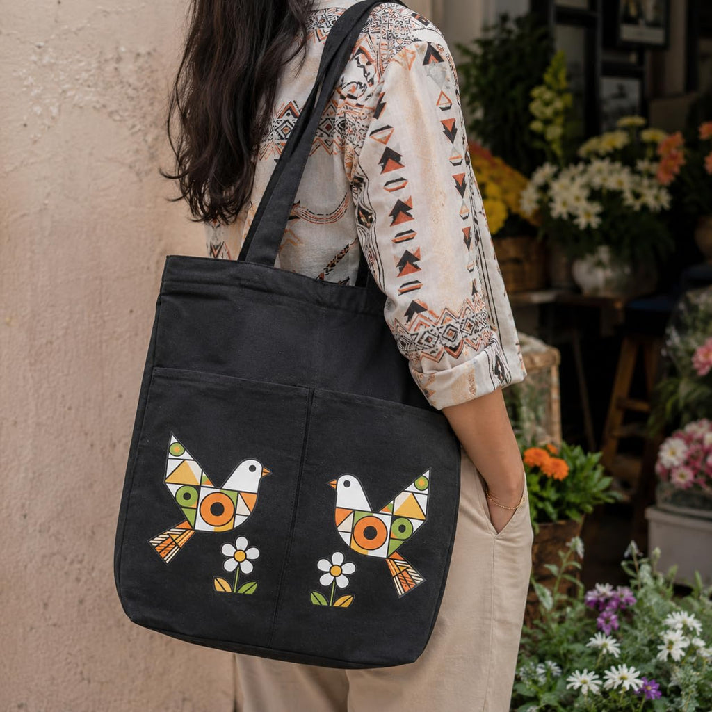 Suryatra Folk Art Mosaic Canvas Tote Bag for Women & Men | Premium Cotton Canvas Shoulder Bag with Dual Front Pockets | Tote Bag for Office, College, Shopping & Travel | Black | 14 x 16 Inches