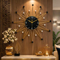 Mahira Artefacts Metal Sunburst Wall Clock with Gold & Black Accents