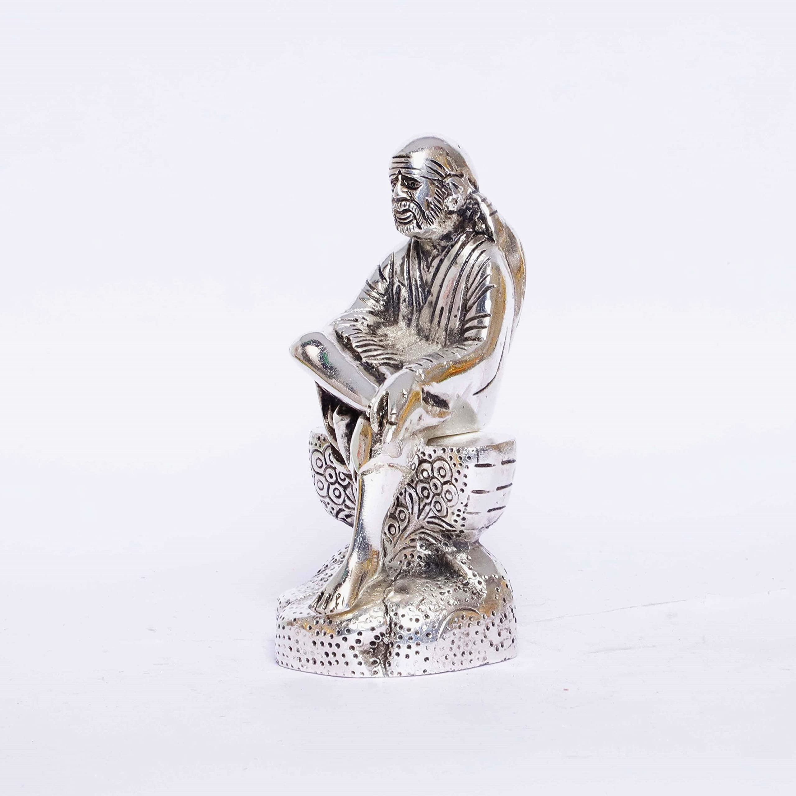 Prince Home Decor & Gifts Silver Plated Sai Baba Sitting on Shila Oxidized Shirdi Sai Baba Metal Statue,Sai Baba Idol Murti Showpiece Gift.
