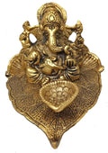 RCI Handicrafts Ganesha Sitting on Leaf with Diya Gold Plated Home Decor (White Metal, 7X9x12cms, Gold)
