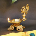 Artvarko Brass Bird Peacock Oil Diya Lamp Table Decor with Stand for Home Diwali Gift Temple Pooja 5.5 Inch
