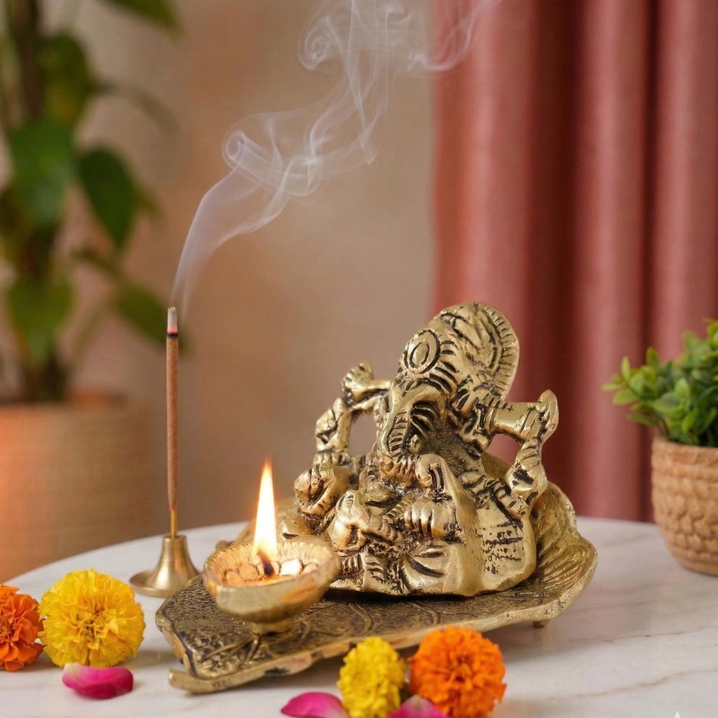KridayKraft Metal Lord Ganesha On Leaf With Diya Idol For Pooja Room Showpiece For Room,Office & Table,Car And Gift For Have Anniversaries, Birthday, Gold