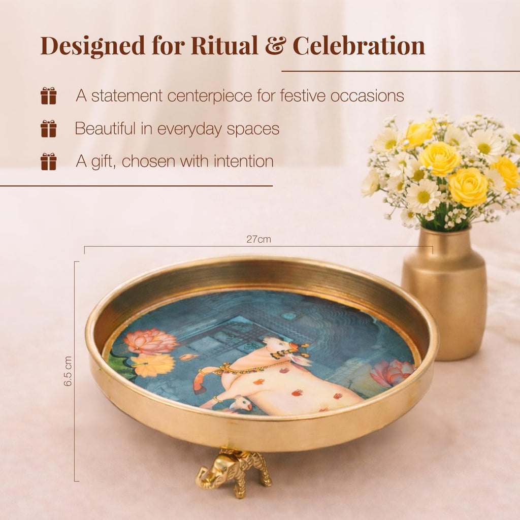 Kaari Tales Pichwai Art Kamadhenu Urli Bowl with Elephant Base | 10-Inch Decorative Metal Urli for Floating Flowers, Diya & Candle | Brass Finish Home Decor for Diwali, Pooja, & Table Centerpiece