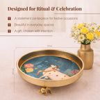 Kaari Tales Pichwai Art Kamadhenu Urli Bowl with Elephant Base | 10-Inch Decorative Metal Urli for Floating Flowers, Diya & Candle | Brass Finish Home Decor for Diwali, Pooja, & Table Centerpiece