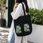 Suryatra Elderblossom Canvas Tote Bag for Women & Men | Premium Cotton Canvas Shoulder Bag with Dual Front Pockets | Tote Bag for Office, College, Shopping & Travel | Black | 14 x 16 Inches