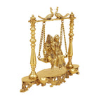 ARTVARKO Brass Radha Krishna Playing Flute On Swing Idol Statue Love Couple Radha Krishan with Diya Double Peacock on Jhoola 16 Inch