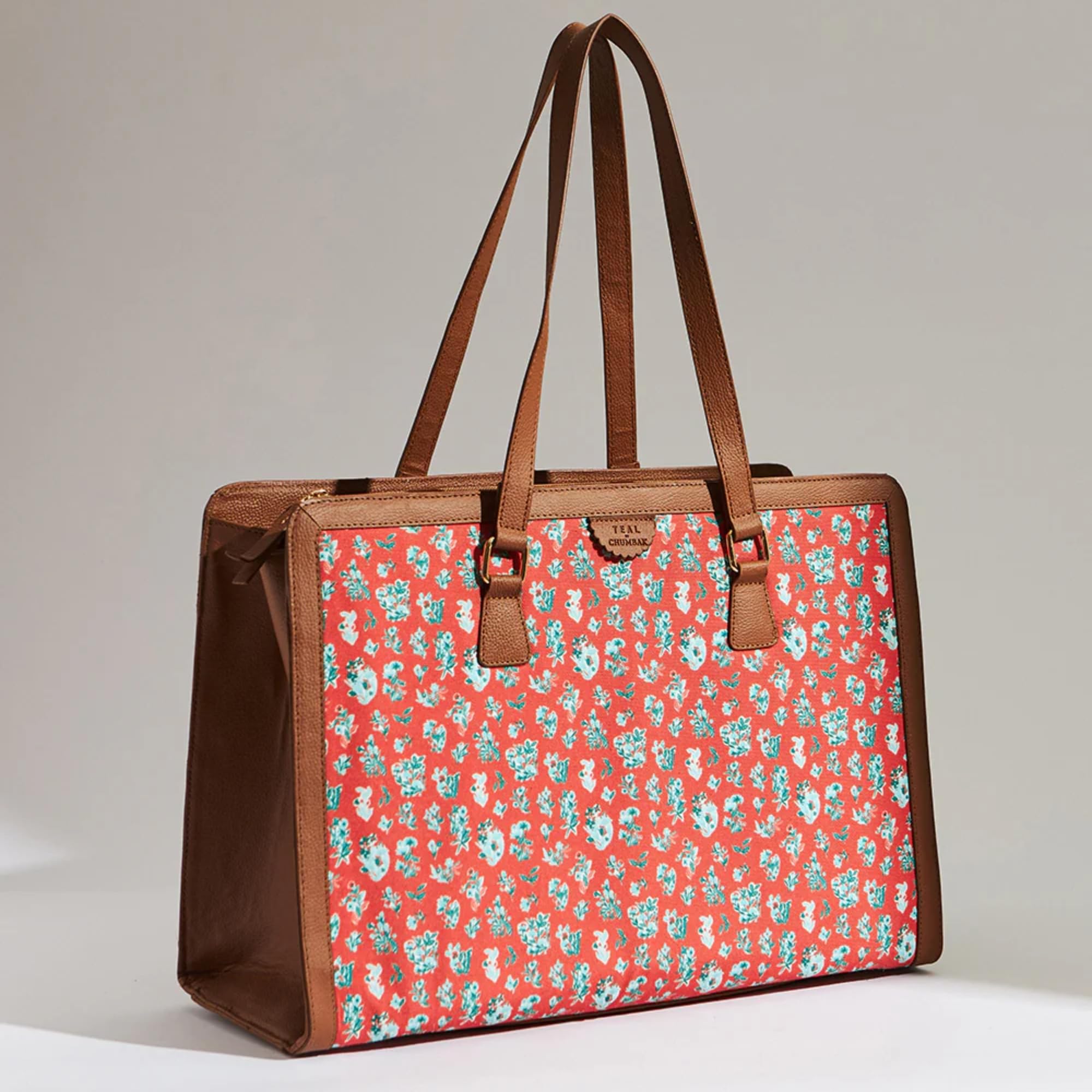 TEAL BY CHUMBAK Tote Bags