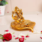 KridayKraft Metal Ganesha Sitting on Leaf Patta with Diya Deepak Home Office Temple Pooja/Festival Good Luck/Wishes/Diwali/Gifting Ganesh Gold Polish (12 x12 x 8 cm)