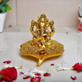 KridayKraft Metal Ganesha Sitting on Leaf Patta with Diya Deepak Home Office Temple Pooja/Festival Good Luck/Wishes/Diwali/Gifting Ganesh Gold Polish (12 x12 x 8 cm)