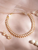 Rubans 22K Gold-Plated Handcrafted Artificial Jewelry Oval Choker Set with Pearl Studded And Matching Earrings For Women and Girls – Perfect for Weddings and Special Occasions