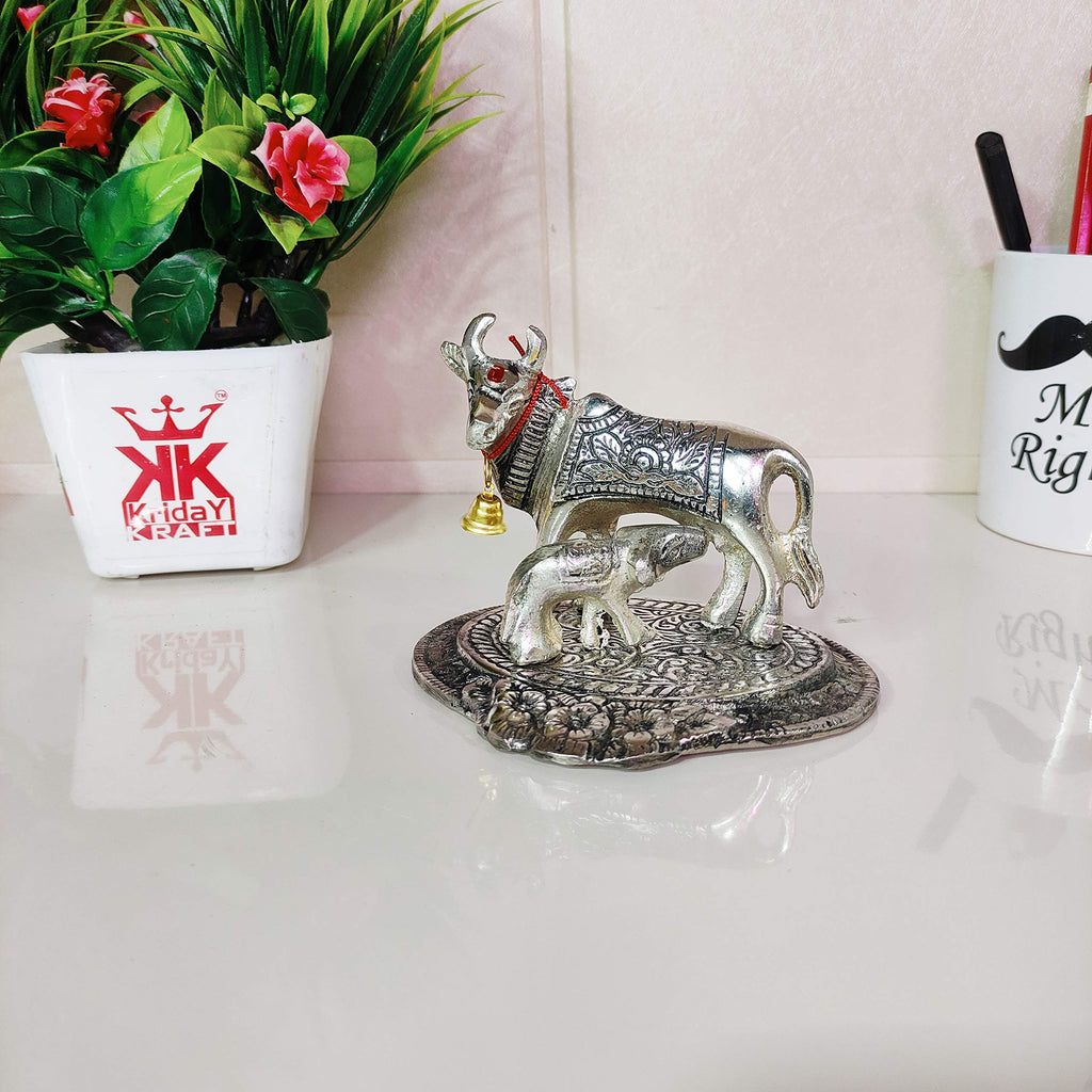 KridayKraft Kamdhenu Cow,Calf with Bal Gopal Krishna Metal Statue for Good Luck,Feng Shui As Table Top Figurine,Vastu,Religious Gau MATA Idol Home,Office&Table (Silver, Small)