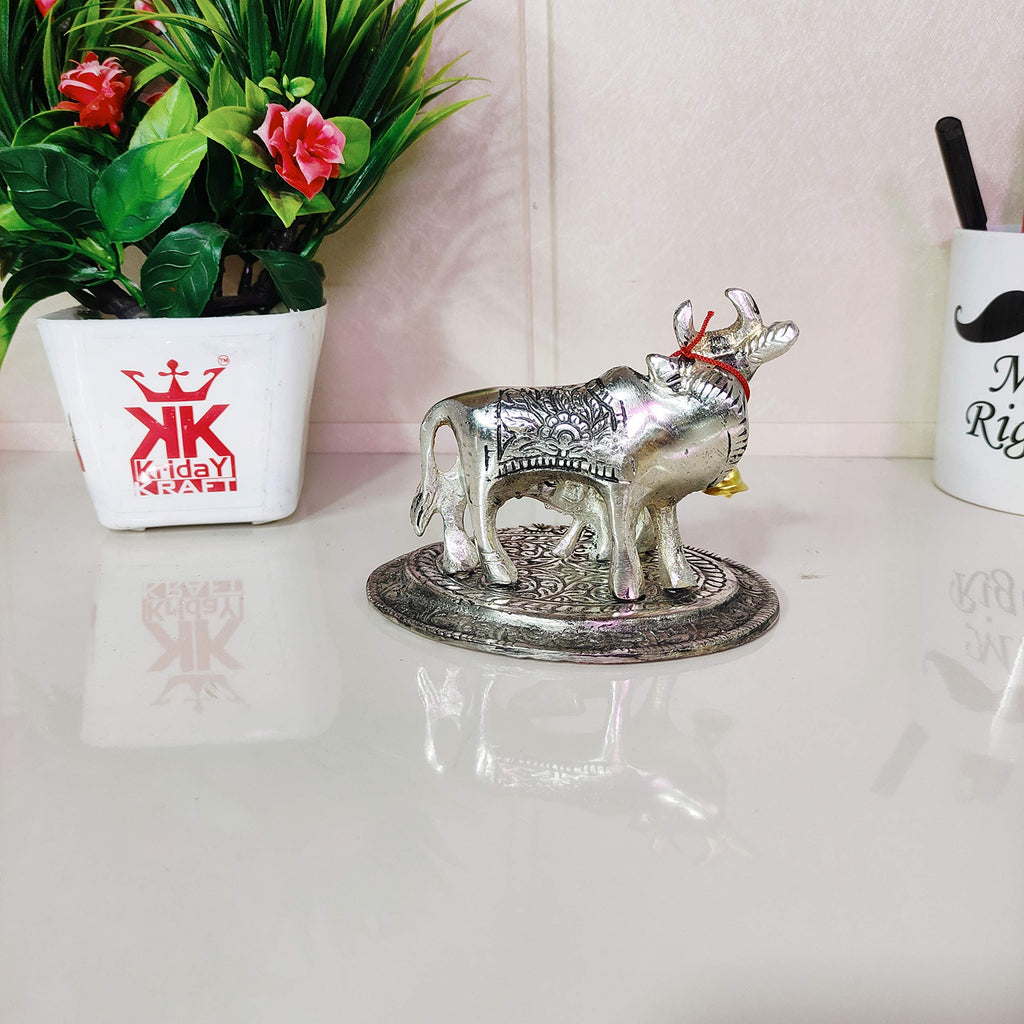 KridayKraft Kamdhenu Cow,Calf with Bal Gopal Krishna Metal Statue for Good Luck,Feng Shui As Table Top Figurine,Vastu,Religious Gau MATA Idol Home,Office&Table (Silver, Small)