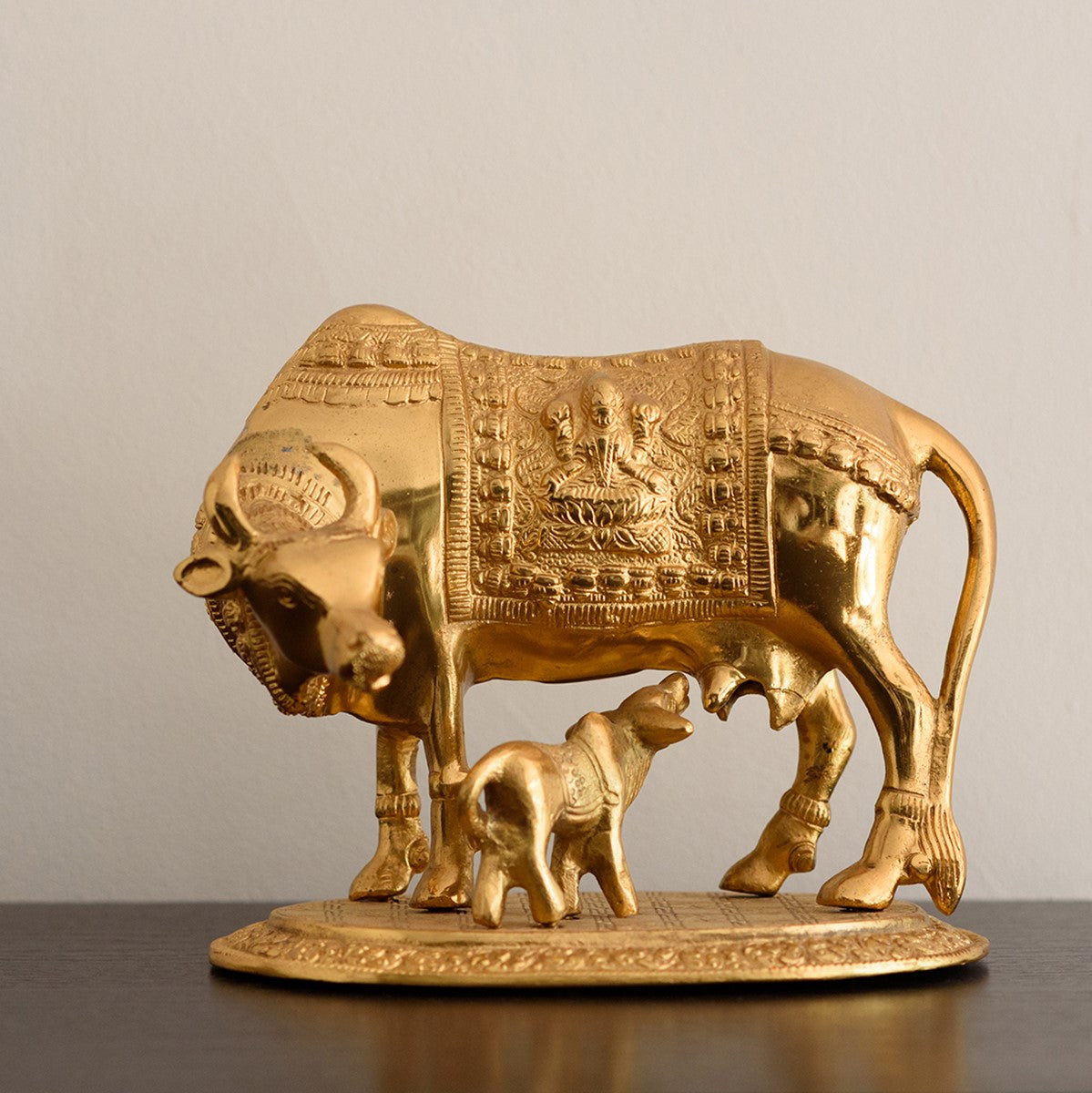Golden Metal Kamdhenu Cow and Calf statue Kafalo