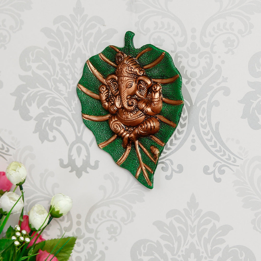 Brown Beautiful Lord Ganesha On Green Leaf Metal Wall Hanging Kafalo