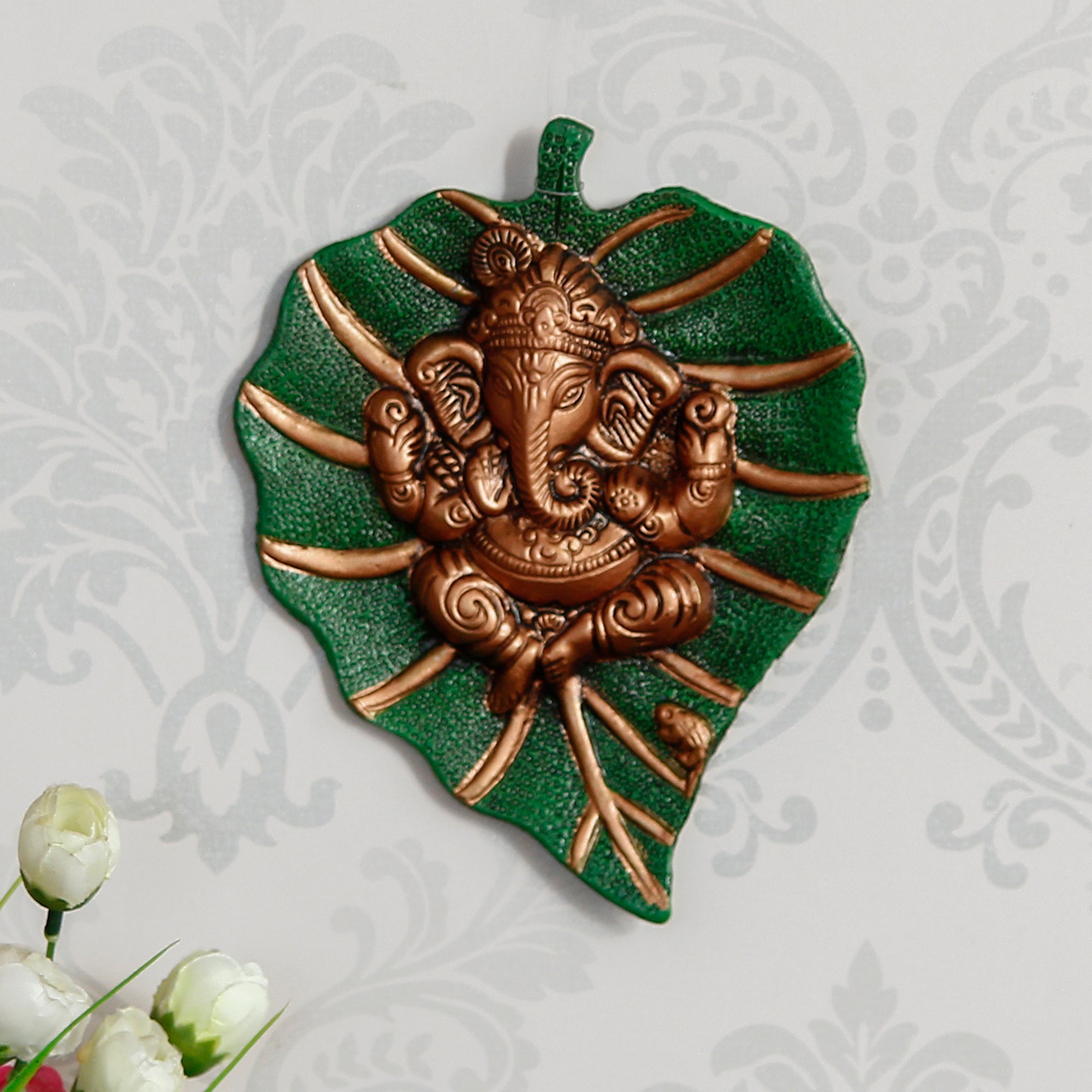 Brown Beautiful Lord Ganesha On Green Leaf Metal Wall Hanging Kafalo