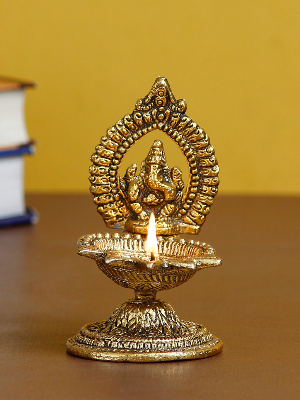 Lord Ganesha Idol with Diya Handcrafted Golden Metal Showpiece Kafalo
