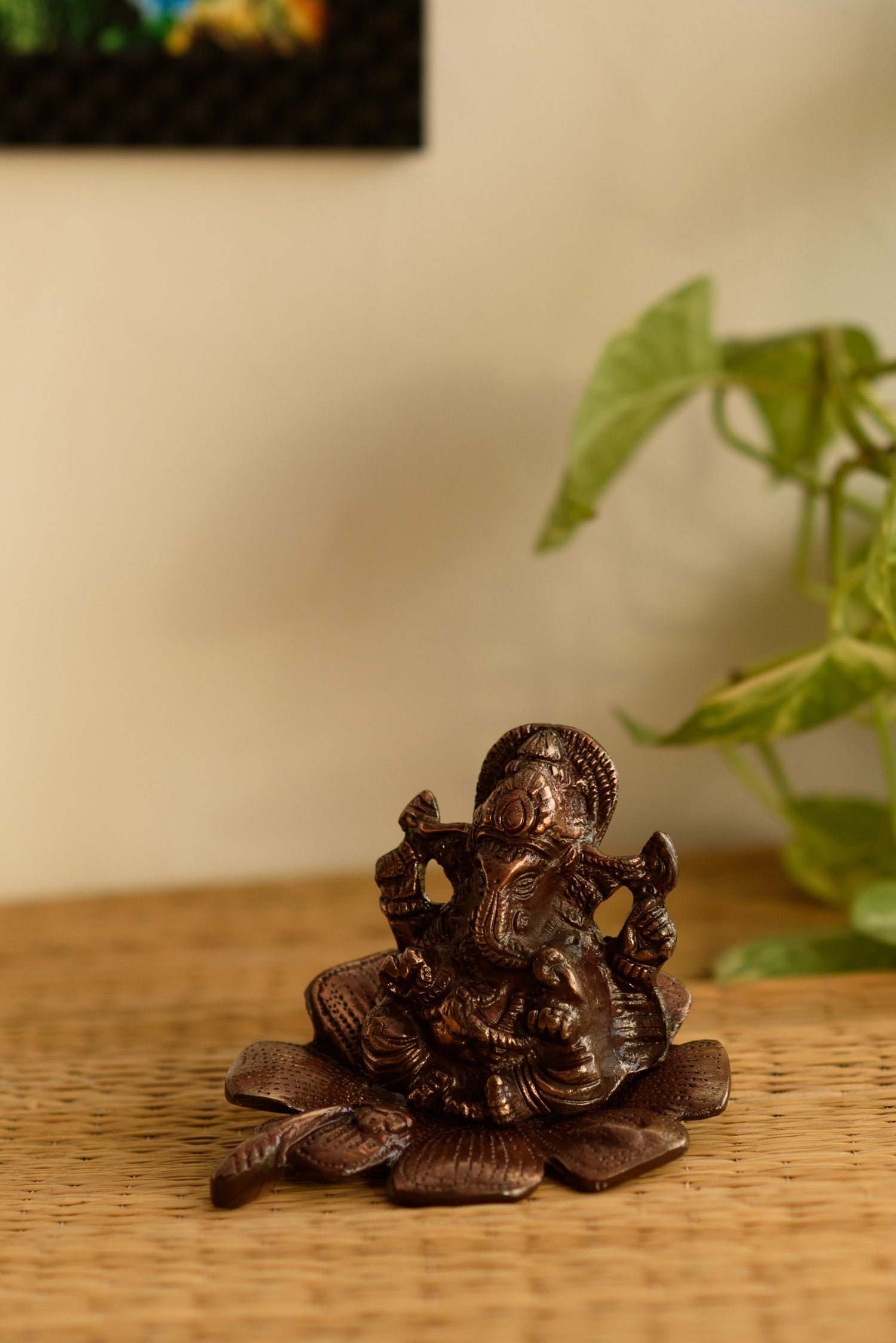 Metal Lord Ganesha Idol On Flower Kafalo