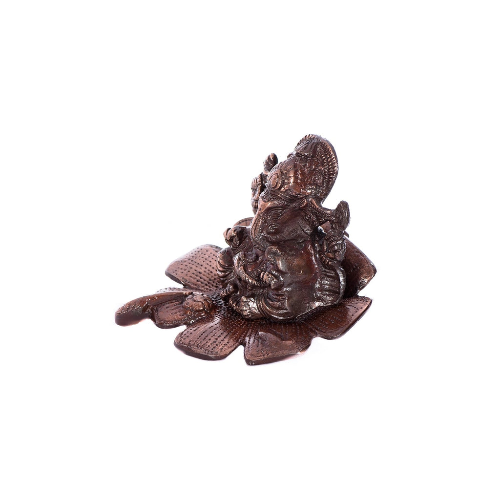 Metal Lord Ganesha Idol On Flower Kafalo