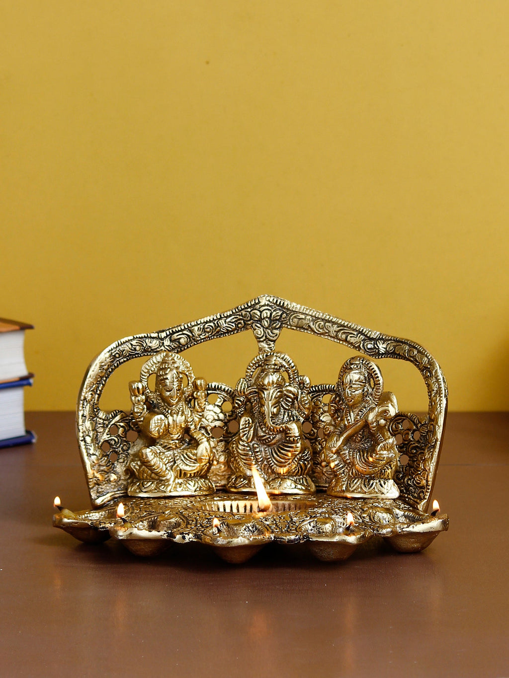 Golden Metal Handcrafted Laxmi Ganesha Saraswati Idols with Diya for 6 Wicks Kafalo