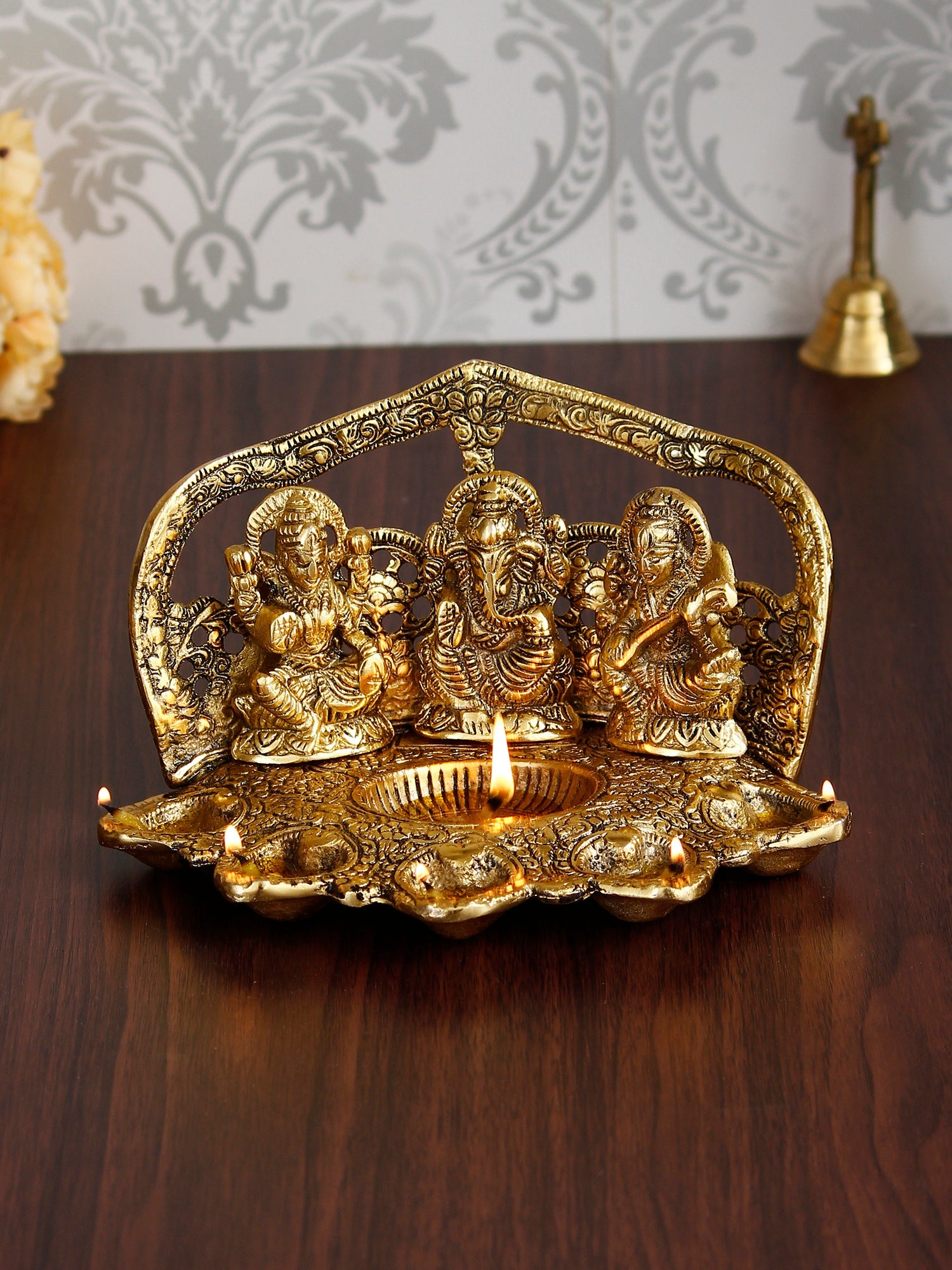 Golden Metal Handcrafted Laxmi Ganesha Saraswati Idols with Diya for 6 Wicks Kafalo