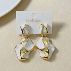 White And Gold Abstract Danglers Nestasia