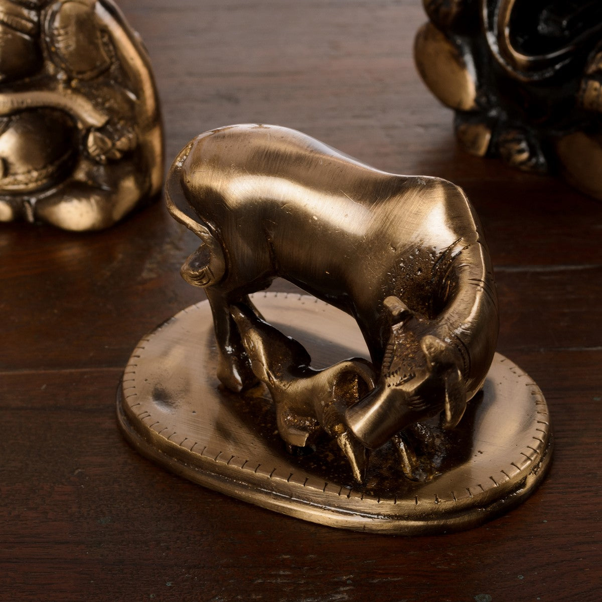 Brown Brass Kamdhenu cow and calf idol Kafalo