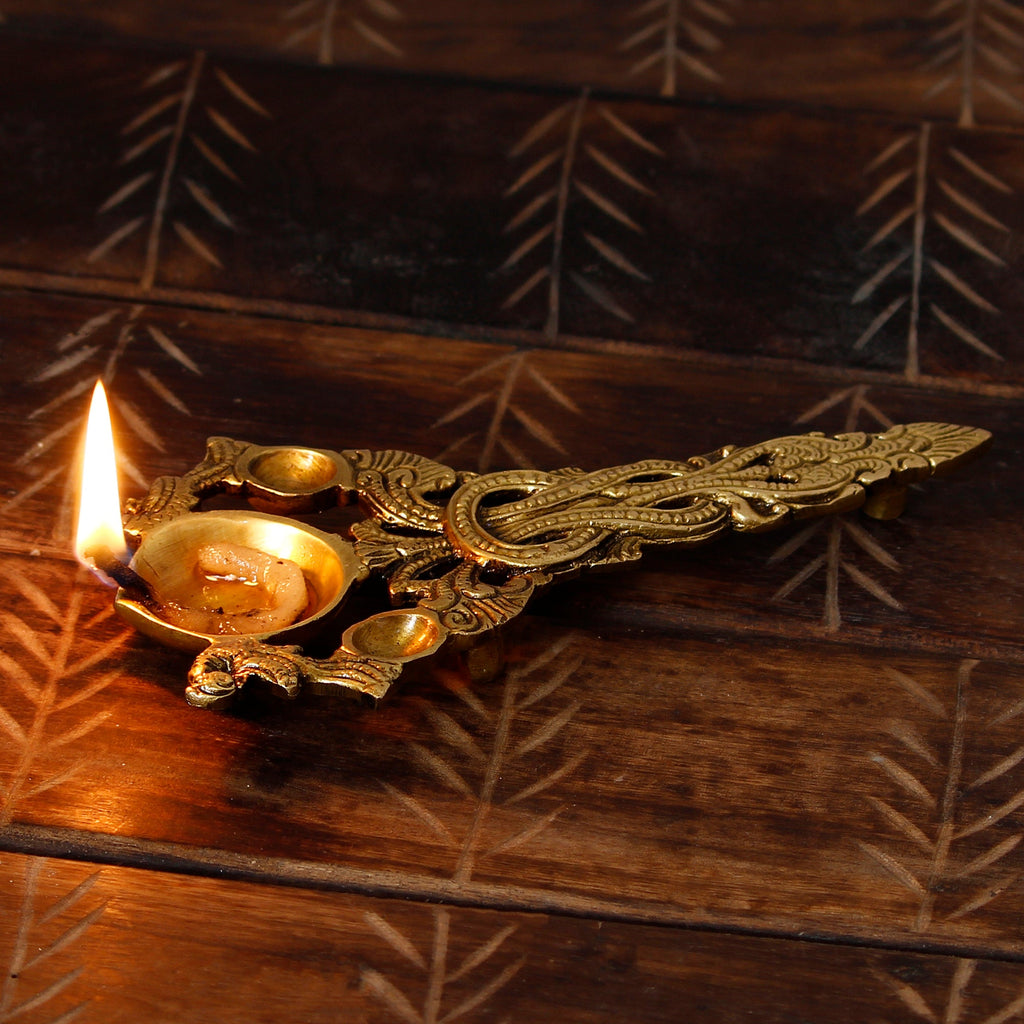 Golden Ethnic Carved Brass Diya With Handle For Pooja Room And Temples Kafalo