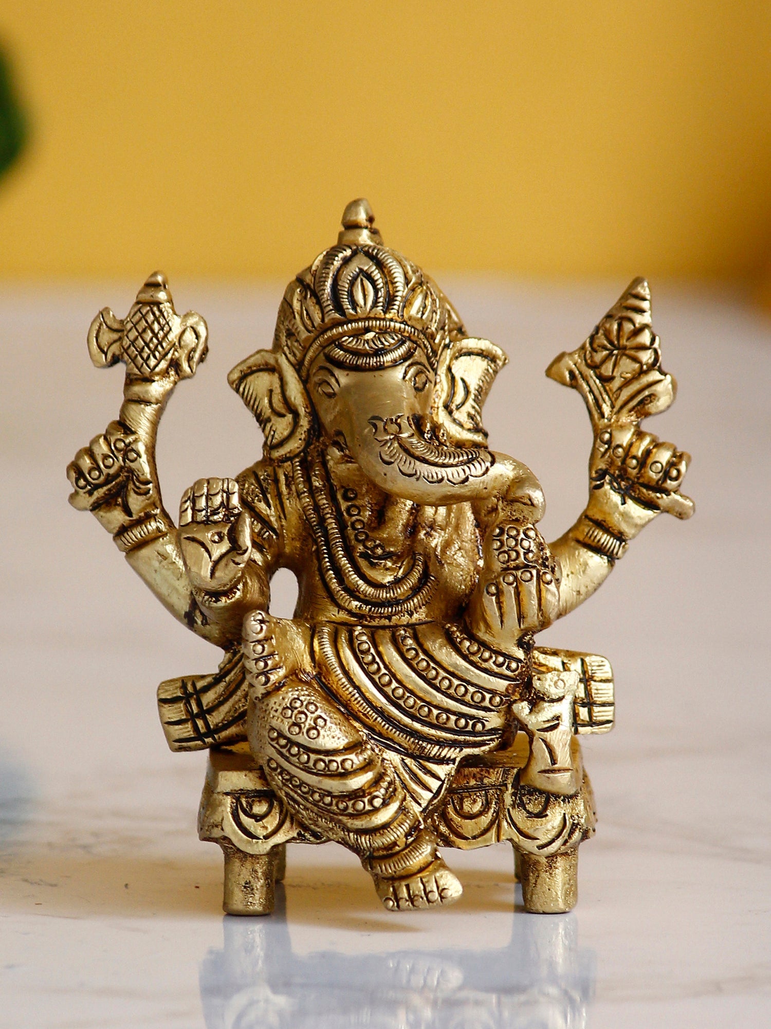 Golden Brass Handcrafted 4 Bhujadhari Lord Ganesha Idol on Chowki Kafalo