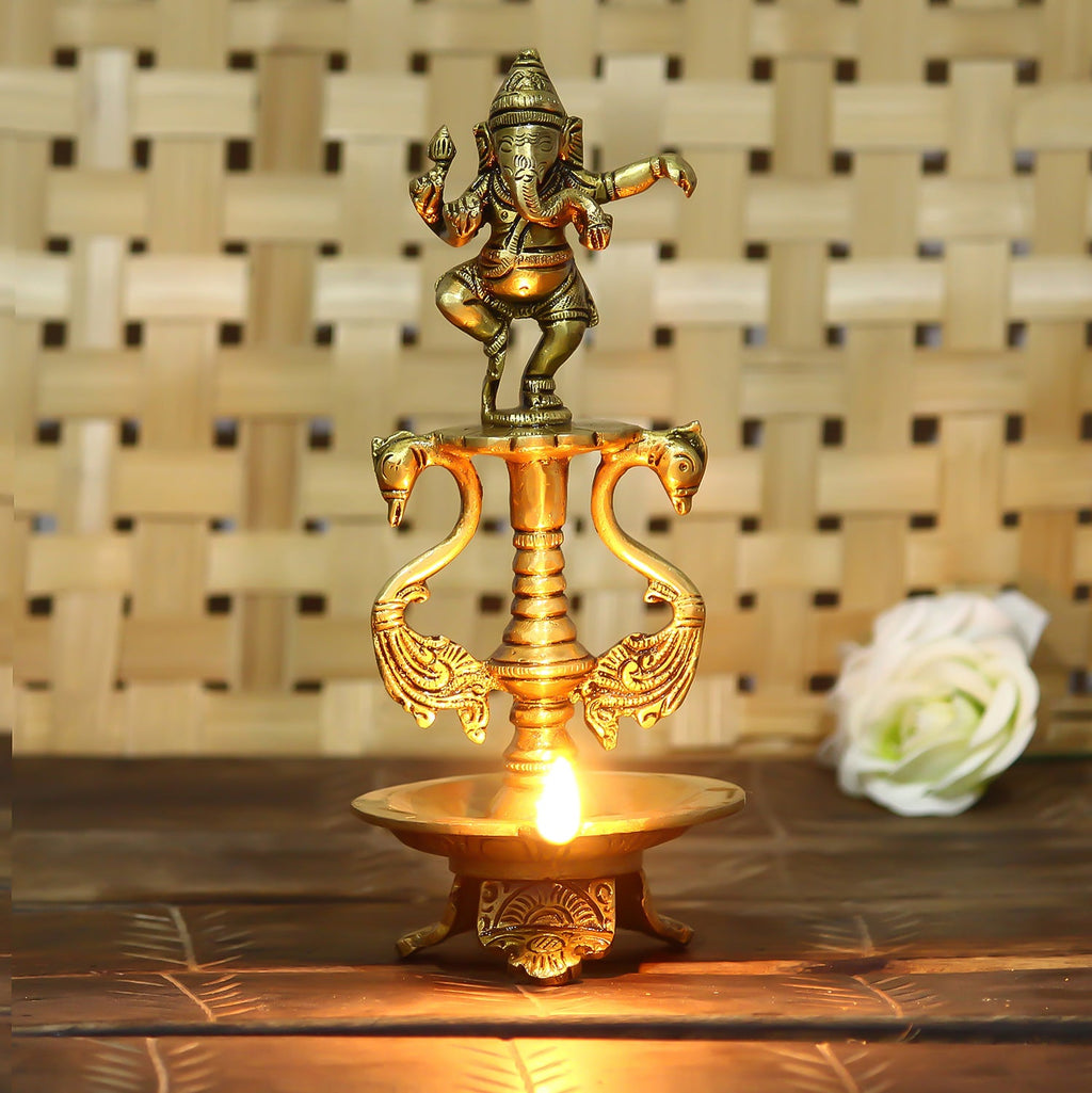 Golden Brass Diya with Lord Ganesha Idol and Peacock Design Stand Kafalo