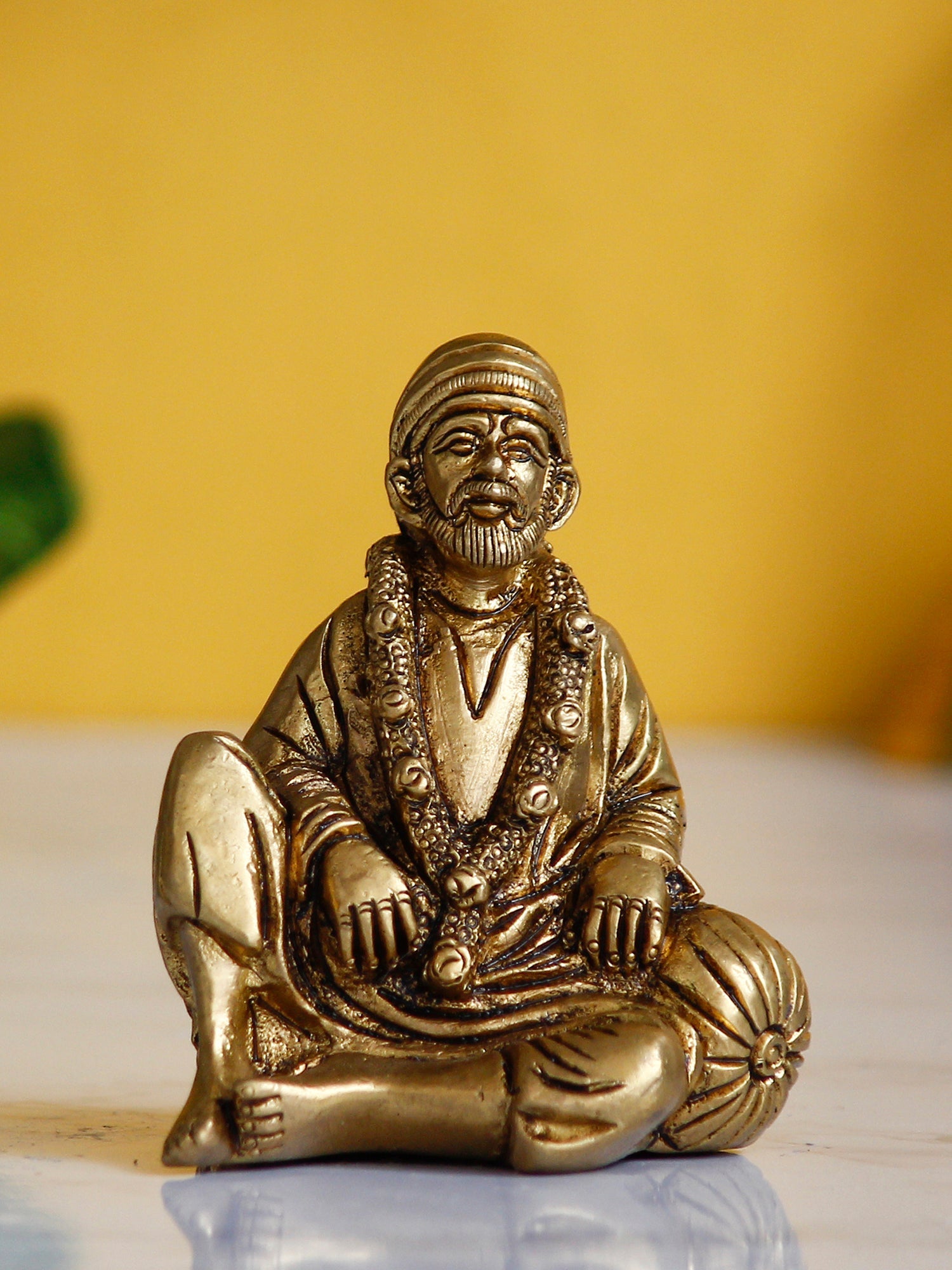 Golden Brass Handcrafted Sitting Sai Baba Idol Kafalo