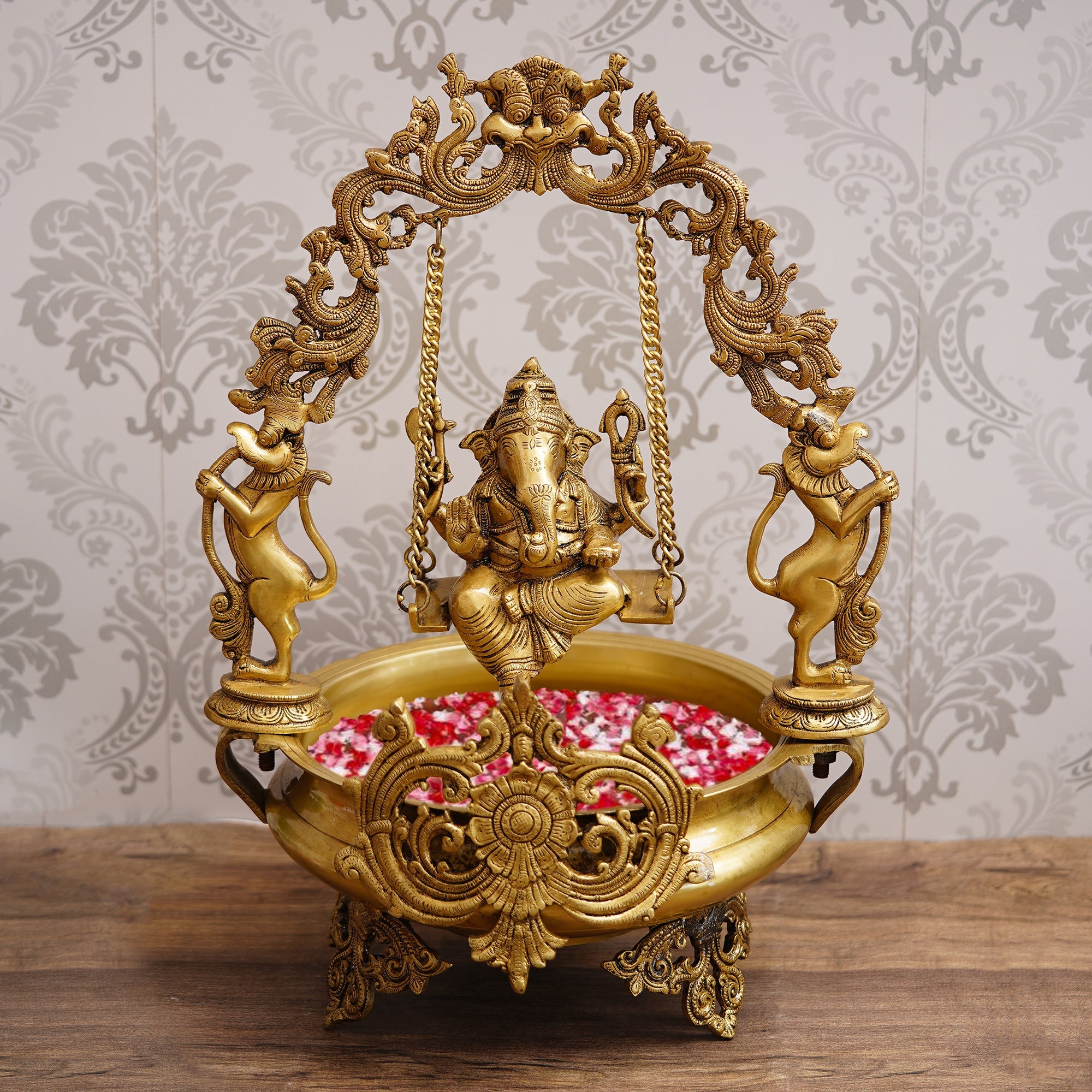 Golden Lord Ganesha on Swing Premium Decorative Handcrafted Brass Urli Kafalo
