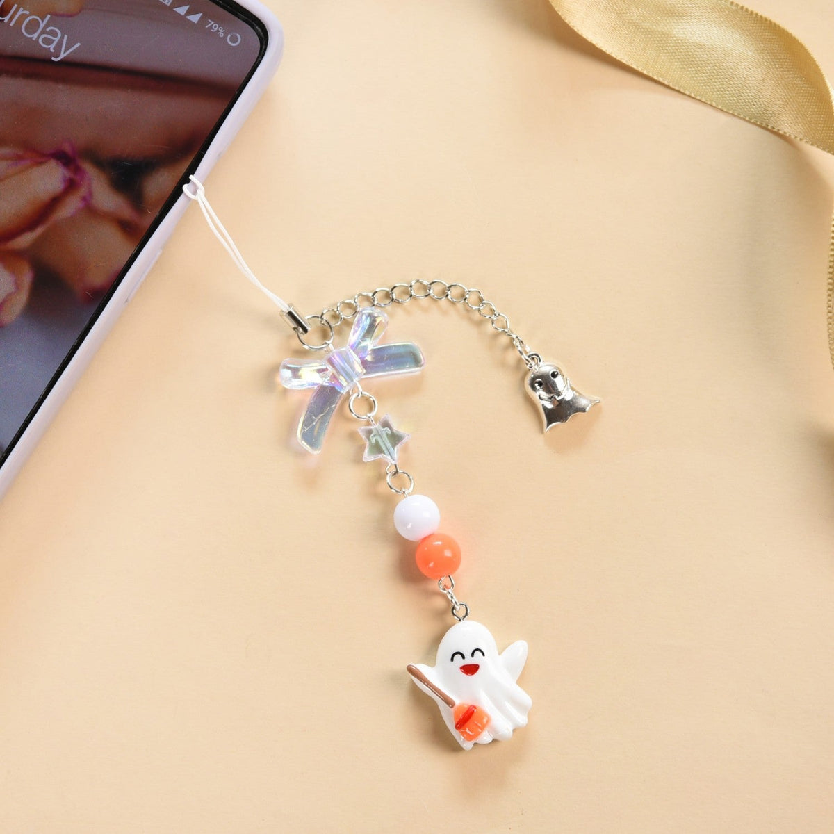 Baby Ghost On A Broom Phone Strap Nestasia