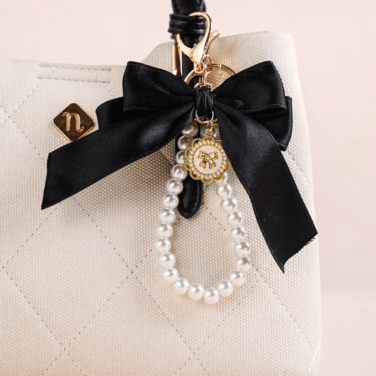 Black Beauty Bow Charm Keychain Nestasia