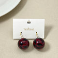 Abstract Patterned Maroon Bead Earrings Nestasia